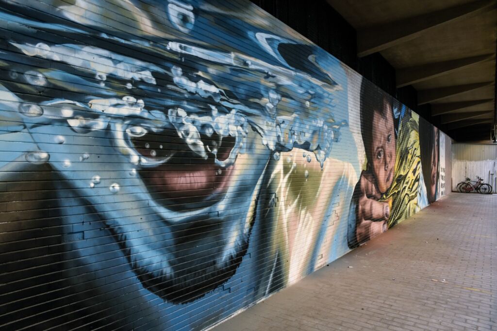 Il murales dell'artista Murales Lian dipinto sul muro dell'ex mercato coperto di Terni, ora demolito